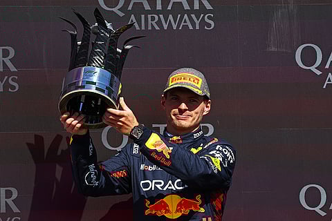 Second placed Max Verstappen celebrates on the podium
